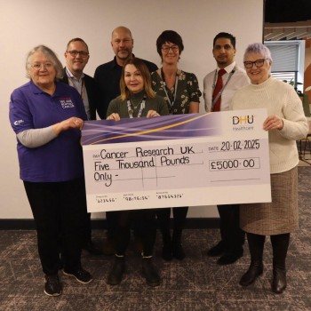 DHU Healthcare Presents £5,000 Cheque to Cancer Research UK Following Sahara Stars Fundraising Success